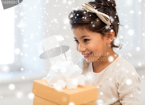 Image of happy child girl with gift box