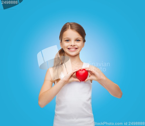 Image of girl in blank white shirt with small red heart