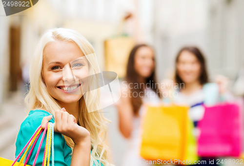 Image of girls with shopping bags in ctiy