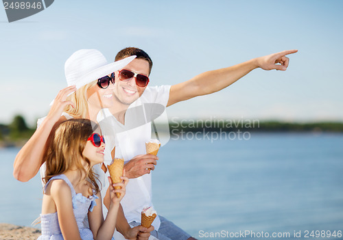 Image of happy family eating ice cream