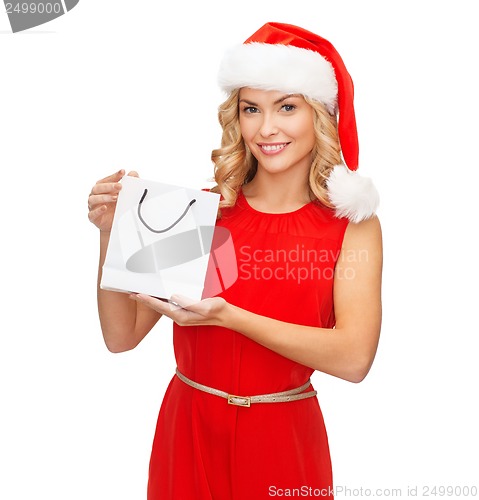 Image of woman in red dress with shopping bag