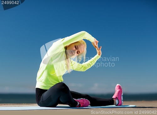 Image of woman doing sports outdoors