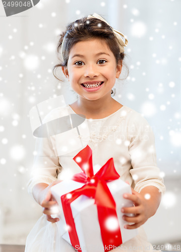 Image of happy child girl with gift box