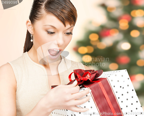 Image of happy woman with gift box