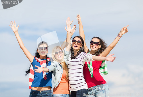 Image of beautiful teenage girls or young women having fun