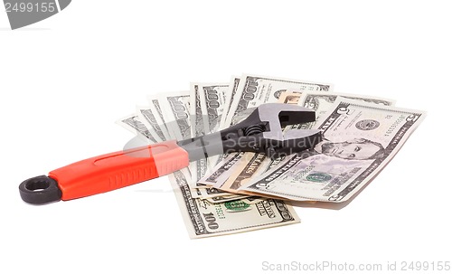 Image of Wrench and bills of dollars