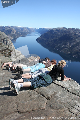 Image of People looking down at pulpit rock