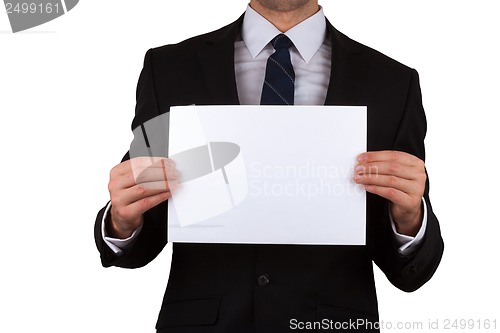 Image of businessman holding white placard