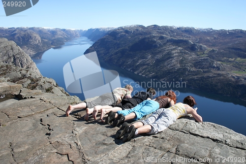 Image of People looking down at pulpit rock