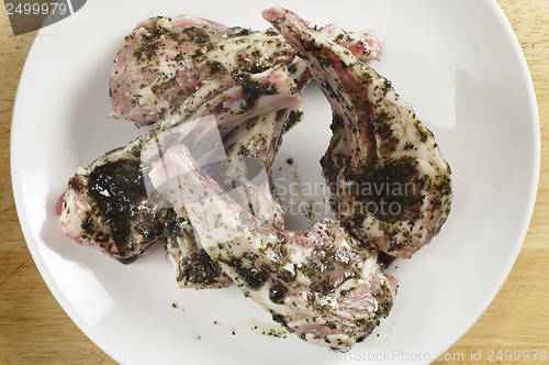 Image of marinading lamb chops from above
