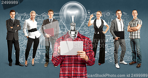 Image of Business Team With Lamp Head