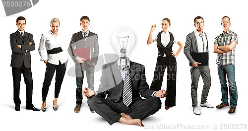 Image of Business Team With Lamp Head