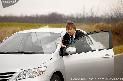 Image of Pushing car