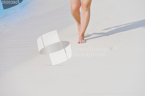 Image of beautiful gril on beach have fun