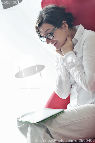 Image of woman using tablet pc