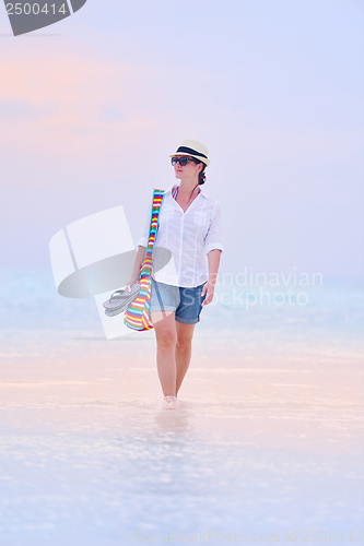 Image of beautiful gril on beach have fun