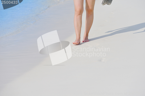 Image of beautiful gril on beach have fun