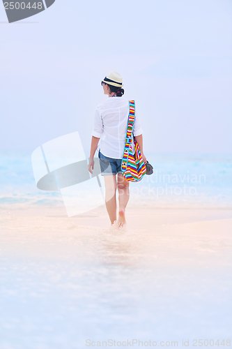 Image of beautiful gril on beach have fun