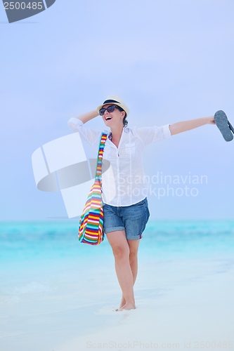 Image of beautiful gril on beach have fun