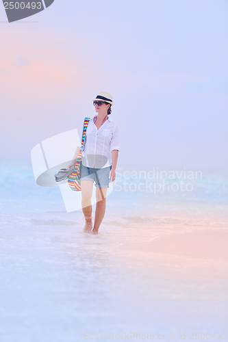 Image of beautiful gril on beach have fun