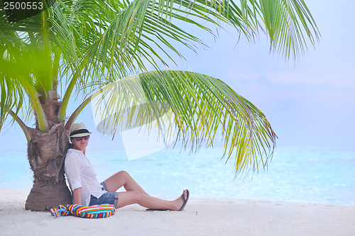 Image of beautiful gril on beach have fun