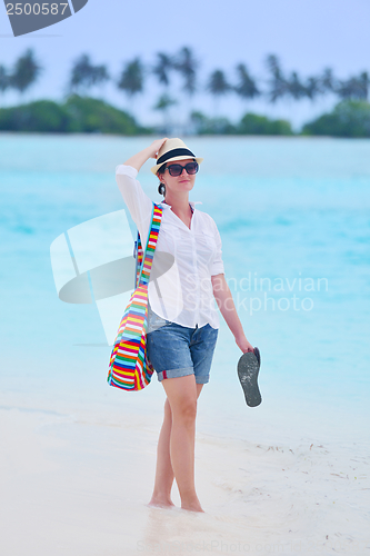 Image of beautiful gril on beach have fun