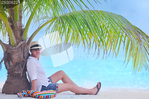 Image of beautiful gril on beach have fun