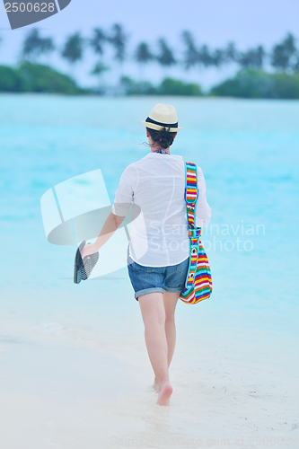 Image of beautiful gril on beach have fun