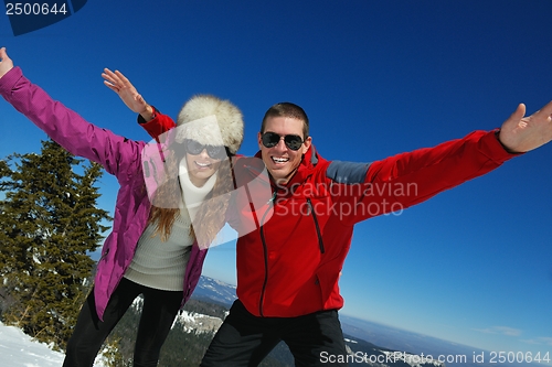 Image of young couple on winter vacation