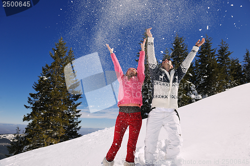 Image of young couple on winter vacation