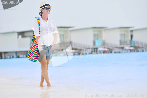 Image of beautiful gril on beach have fun