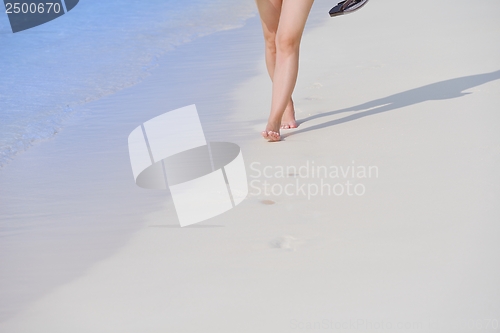 Image of beautiful gril on beach have fun