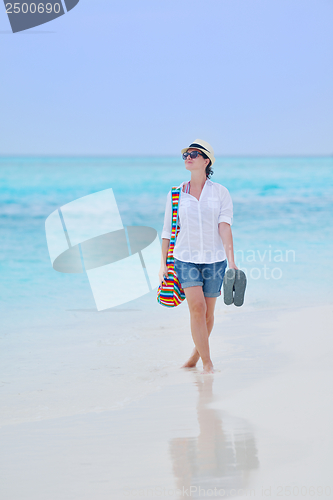 Image of beautiful gril on beach have fun