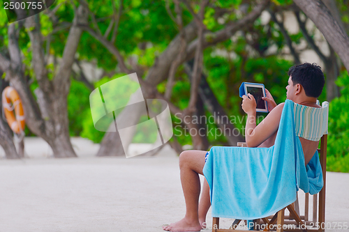 Image of beautiful gril on beach have fun