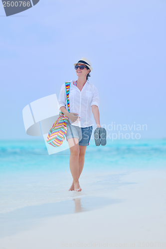 Image of beautiful gril on beach have fun