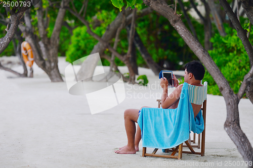 Image of beautiful gril on beach have fun