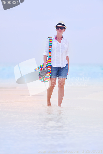 Image of beautiful gril on beach have fun