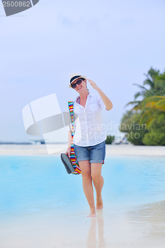 Image of beautiful gril on beach have fun