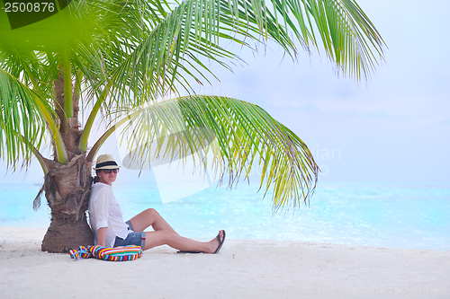 Image of beautiful gril on beach have fun