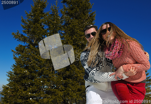 Image of young couple on winter vacation