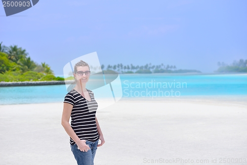 Image of beautiful gril on beach have fun