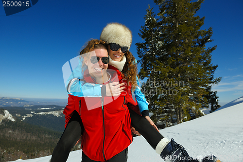 Image of young couple on winter vacation