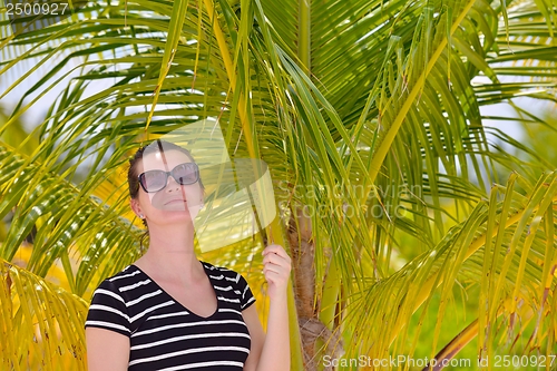 Image of beautiful gril on beach have fun