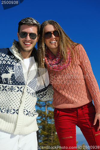 Image of young couple on winter vacation