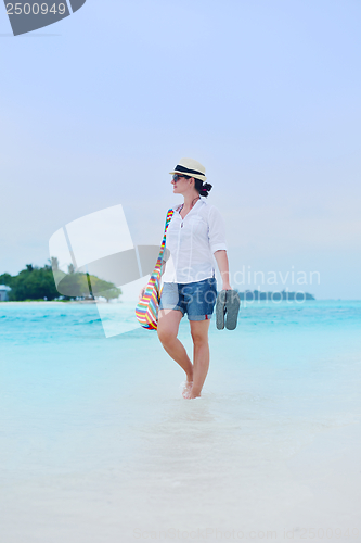 Image of beautiful gril on beach have fun