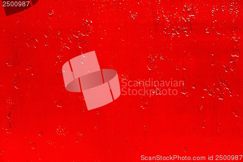 Image of abstract background of old red paint on the metal surface