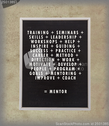 Image of Mentor concept in plastic letters on very old menu board