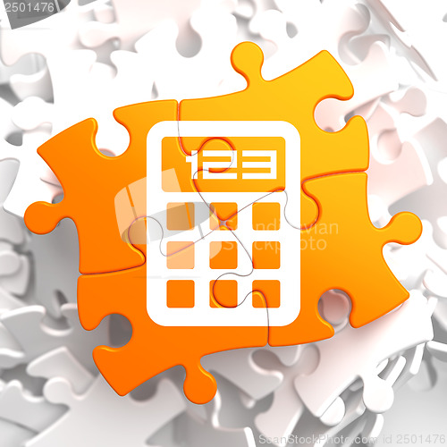 Image of Calculator Icon on Orange Puzzle.