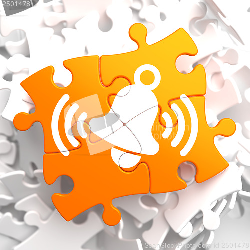 Image of Ringing White Bell Icon on Orange Puzzle.