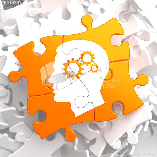 Image of Psychological Concept on Orange Puzzle.